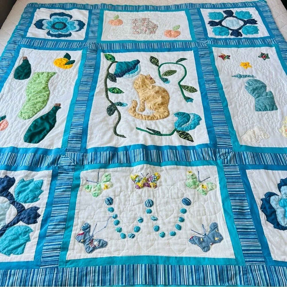 52”x60” Handmade and Hand Stitched Cotton Quilt.